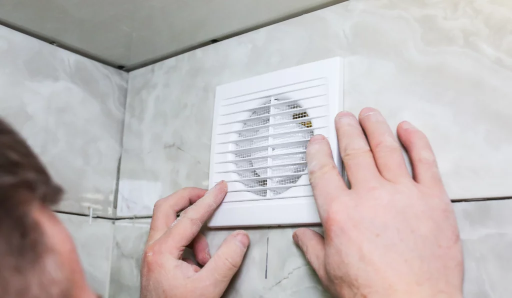 como poner un extractor de baño